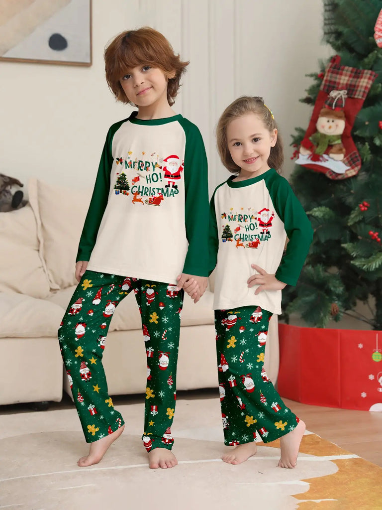 Matching festive green Santa pyjamas for parents and kids