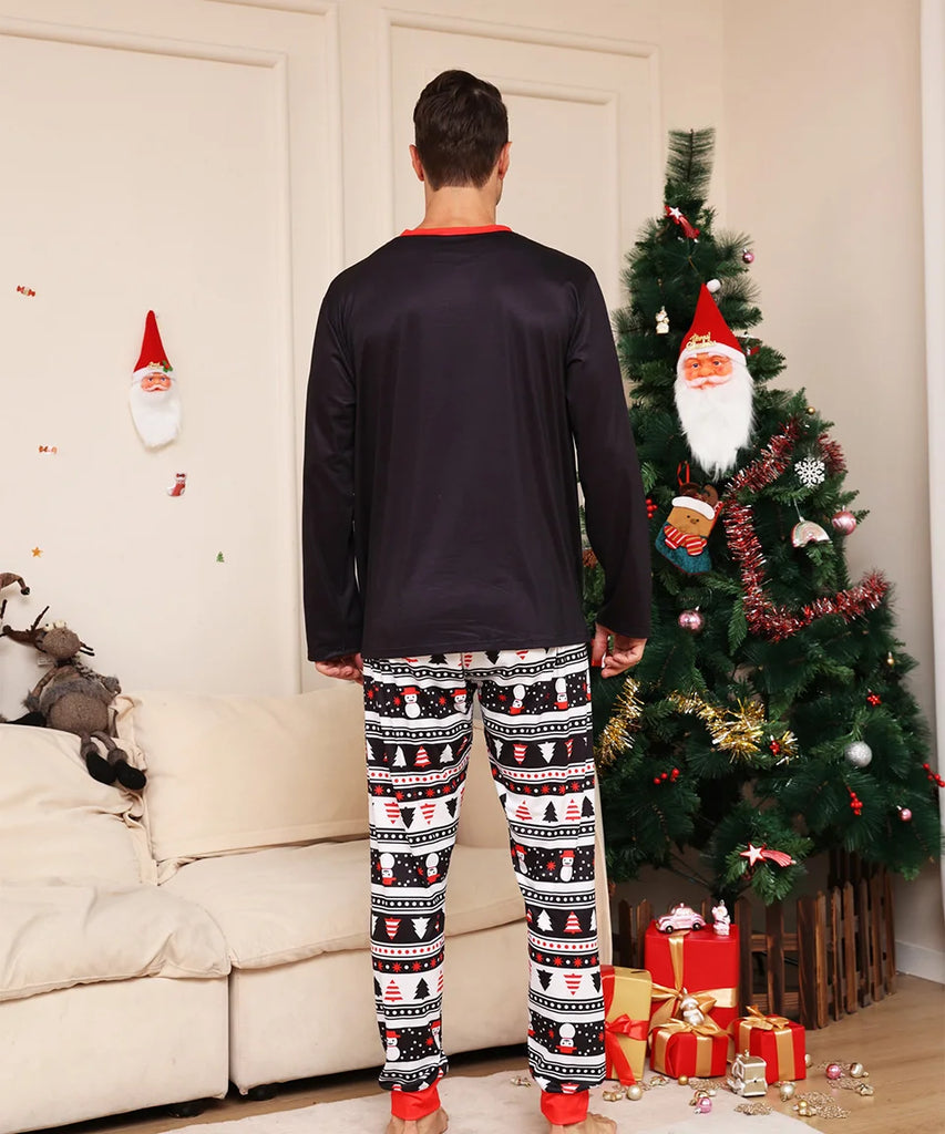 Family pyjamas with cheerful Santa and New Year print