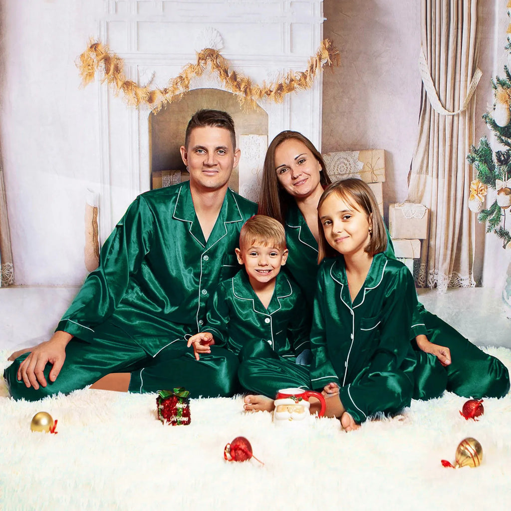 Family matching pyjamas in elegant emerald satin