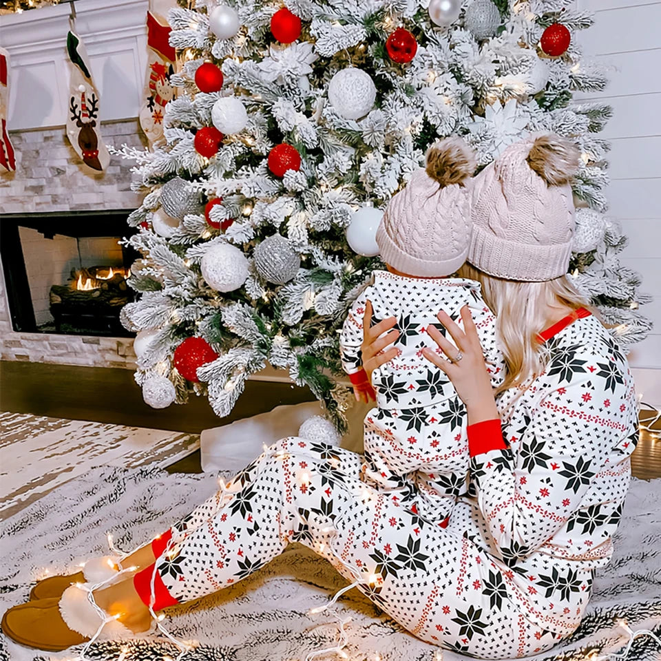 Matching holiday pyjama with snowflakes for all