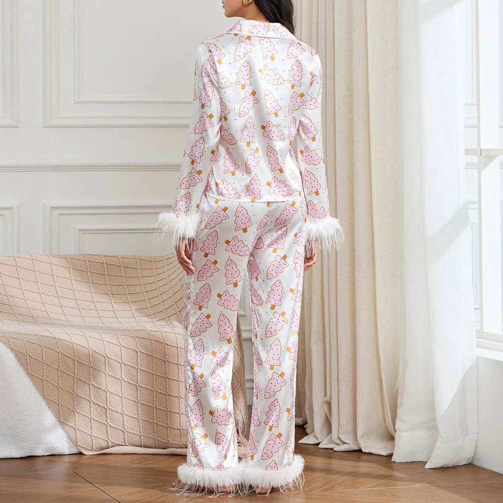 Women’s holiday pyjamas in pink with decorative tree design