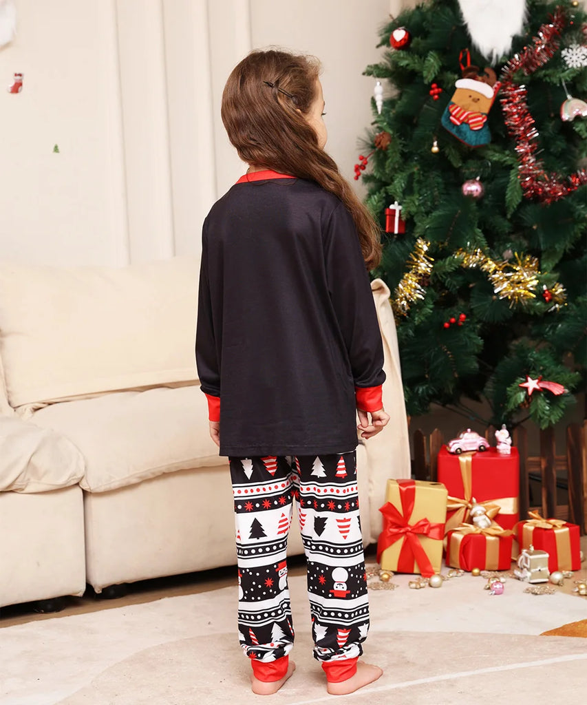 Matching holiday pyjamas featuring festive Santa print