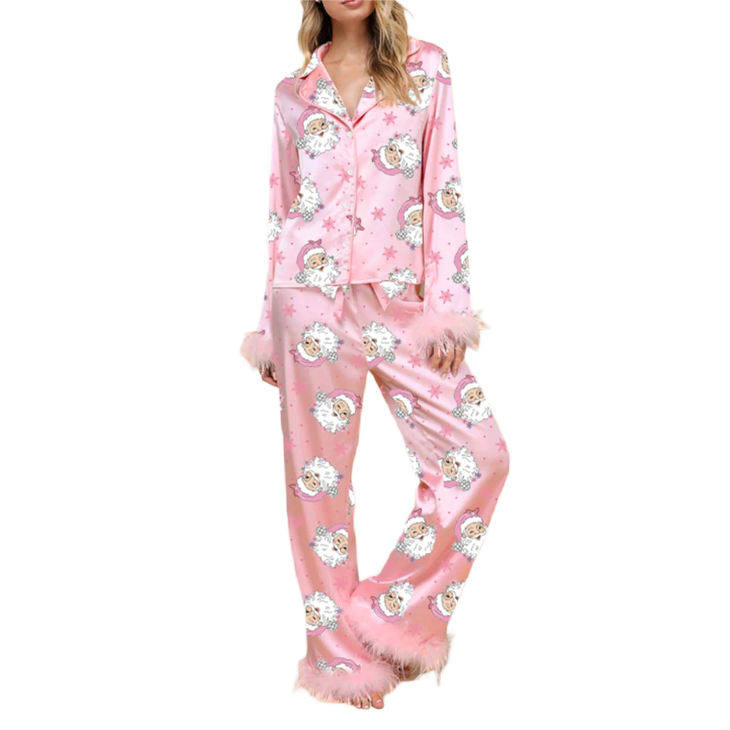 Cosy Women’s pink pyjama set with cheerful Santa pattern for Christmas