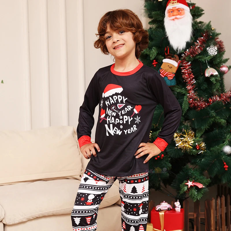 Matching "Happy New Year" pyjamas with Santa print